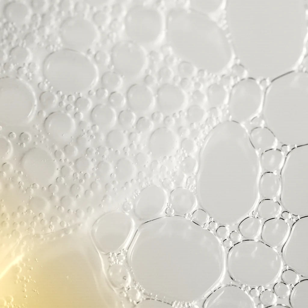 Close-up of clear cleansing foam bubbles from philosophy purity facial cleanser for gentle skin care