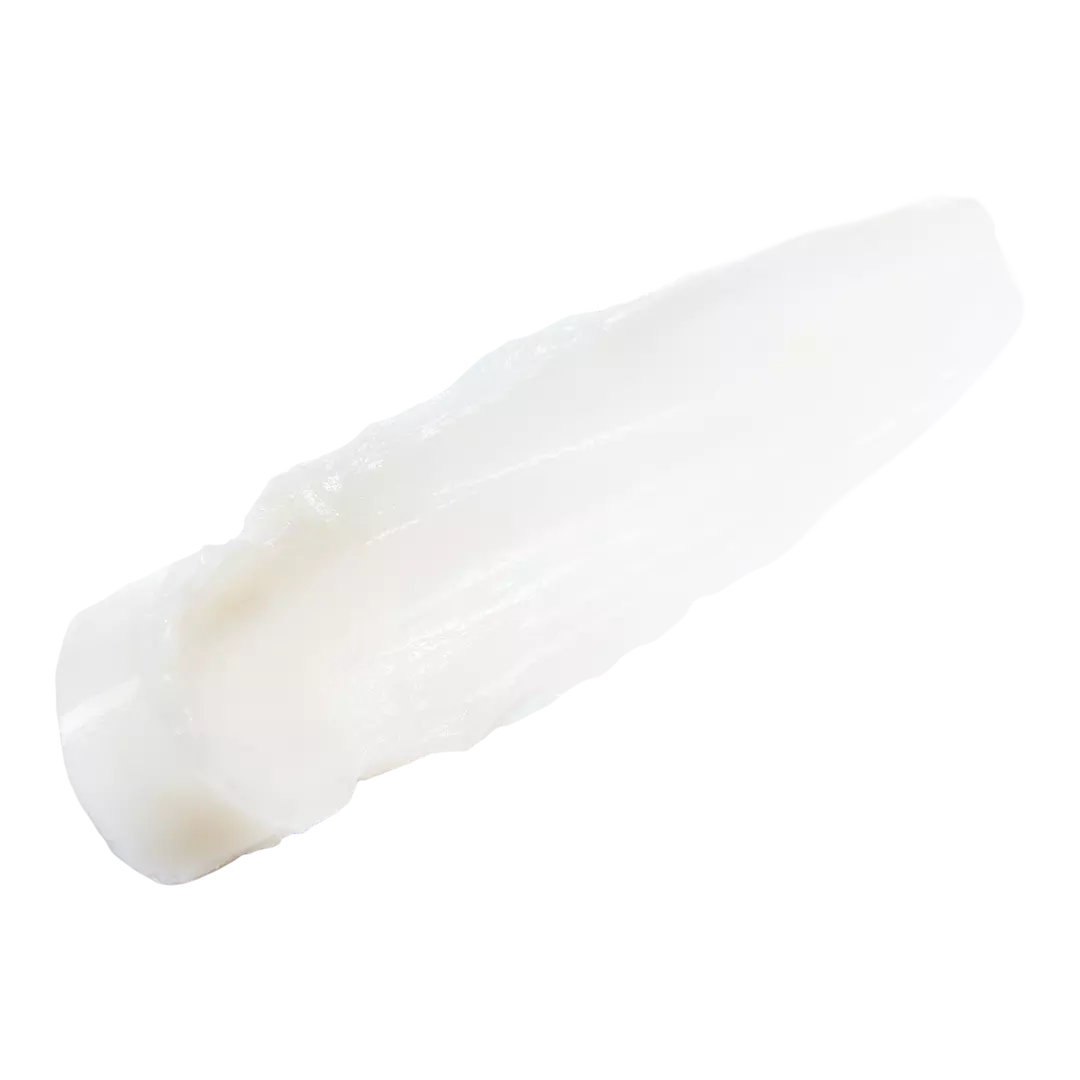 Close-up of creamy texture of philosophy lip serum on black background