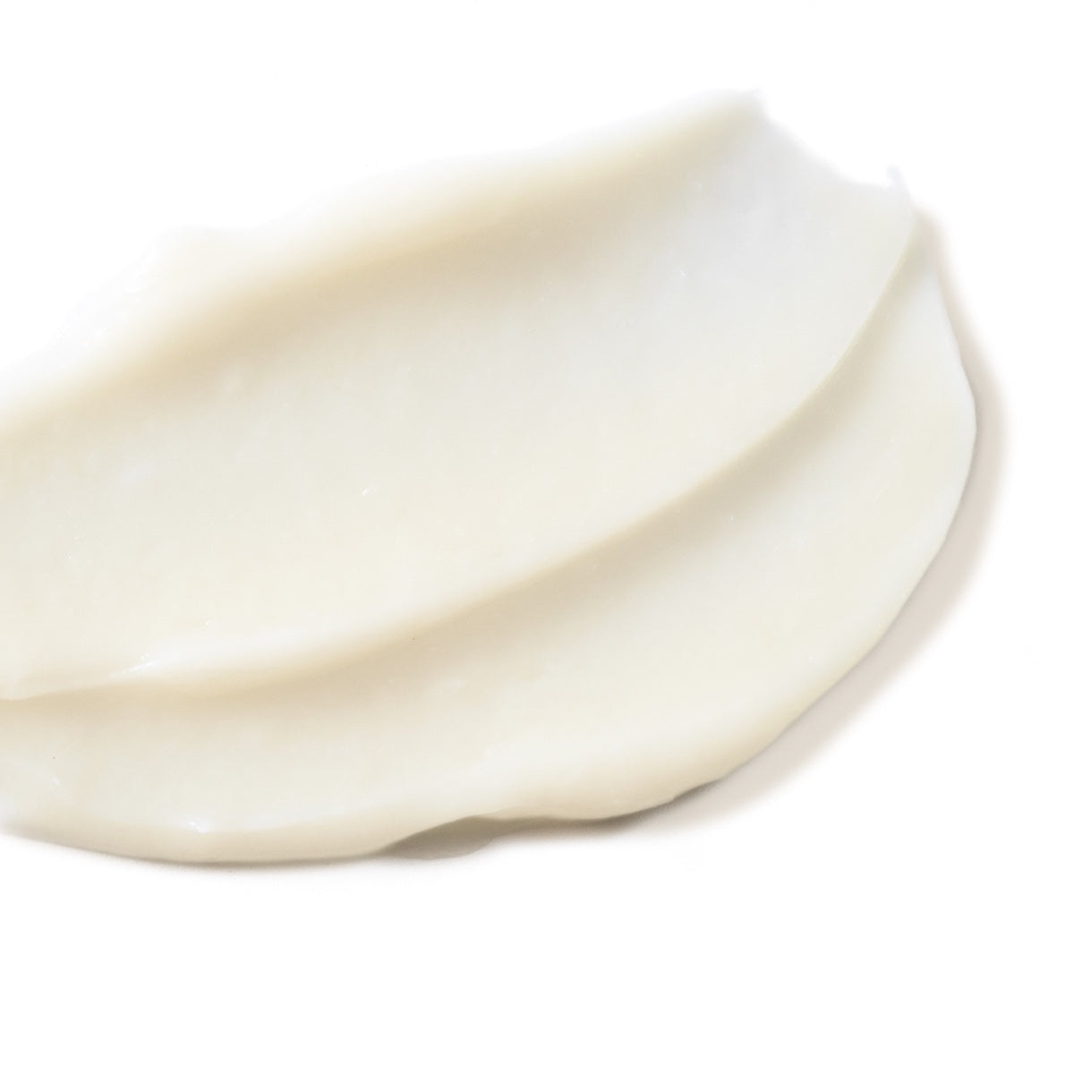 All Golden moisturizer for radiant skin creamy white texture spread on white background