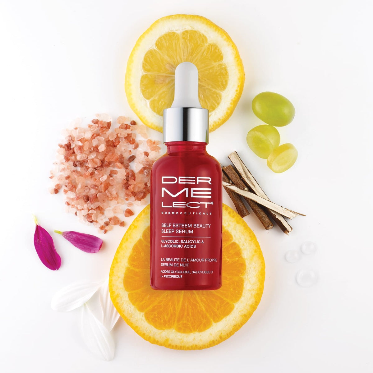 Dermelect Self-Esteem Beauty Sleep Serum red glass dropper bottle surrounded by orange slices pink salt petals grapes