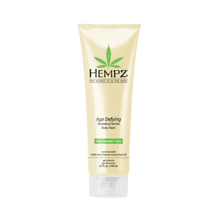 Hempz Age Defying Body Wash in a golden tube, enriched with hemp seed oil for hydration and rejuvenation