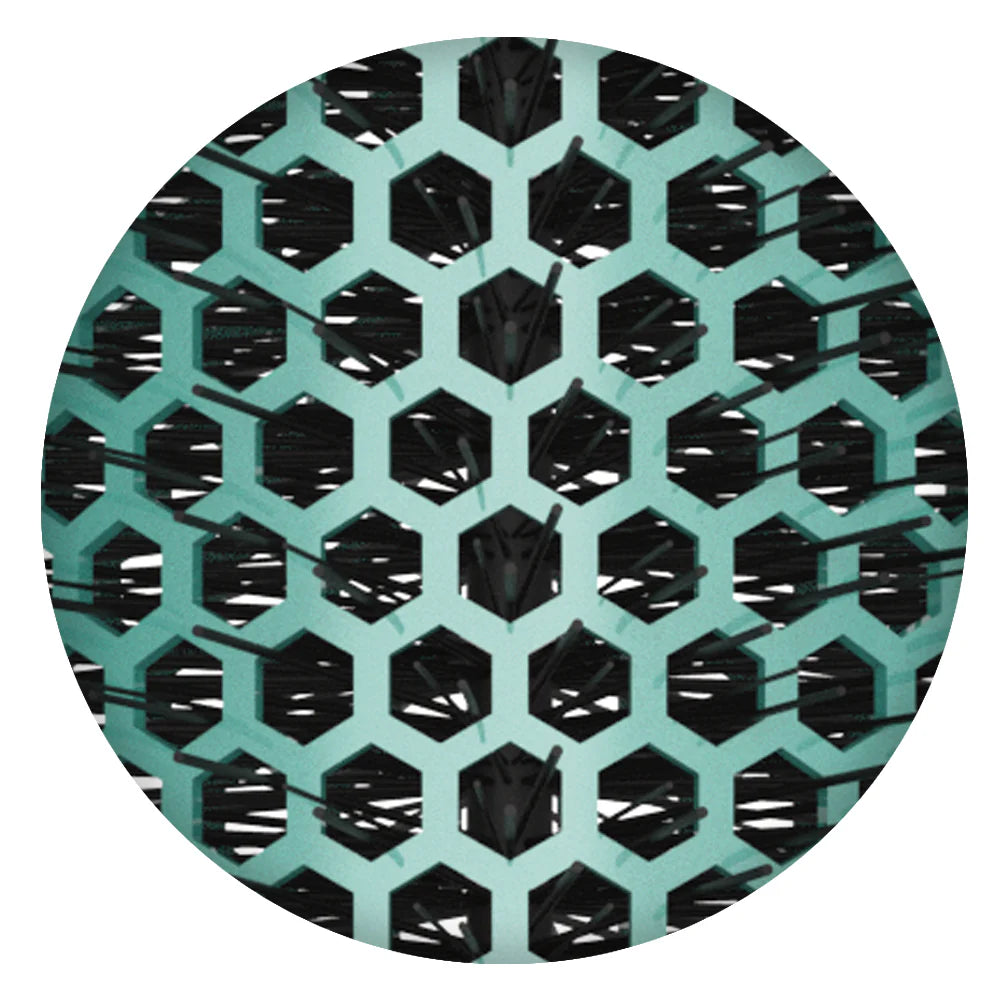 Close-up view of Olivia Garden ceramic brush vented barrel with black bristles and turquoise hexagonal design