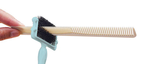 Olivia Garden Comb Cleaner with soft bristles removing hair from beige comb