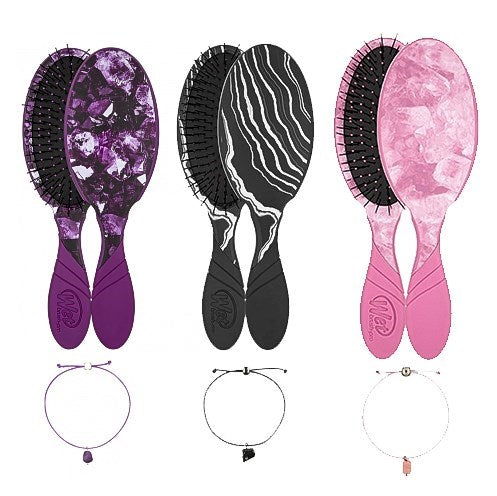 Set of three Wet Brush Mystical Crystal Detangler hair brushes in purple, black, and pink with matching crystal charm bracelets