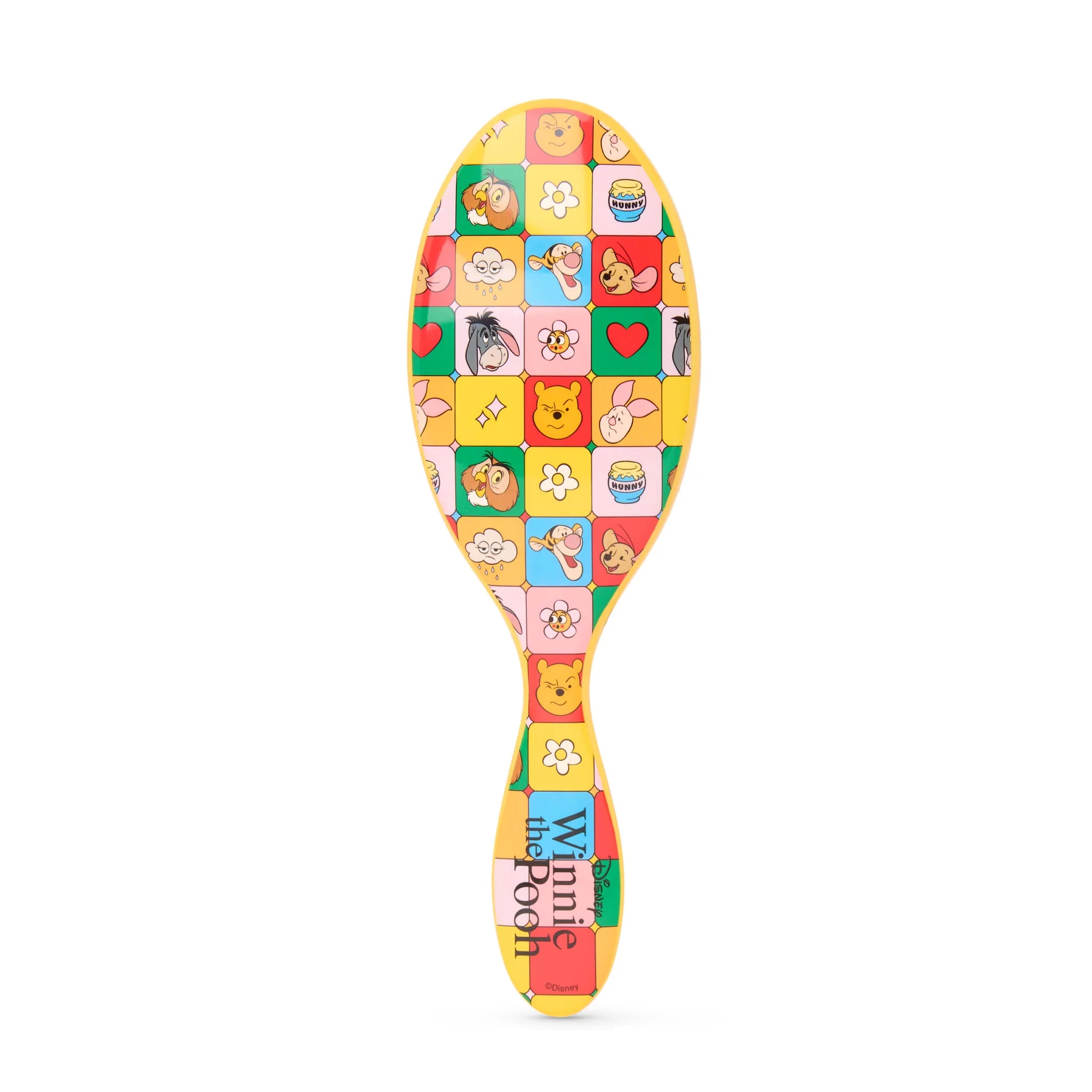 Winnie the Pooh hair detangler brush featuring colorful character designs for easy hair styling