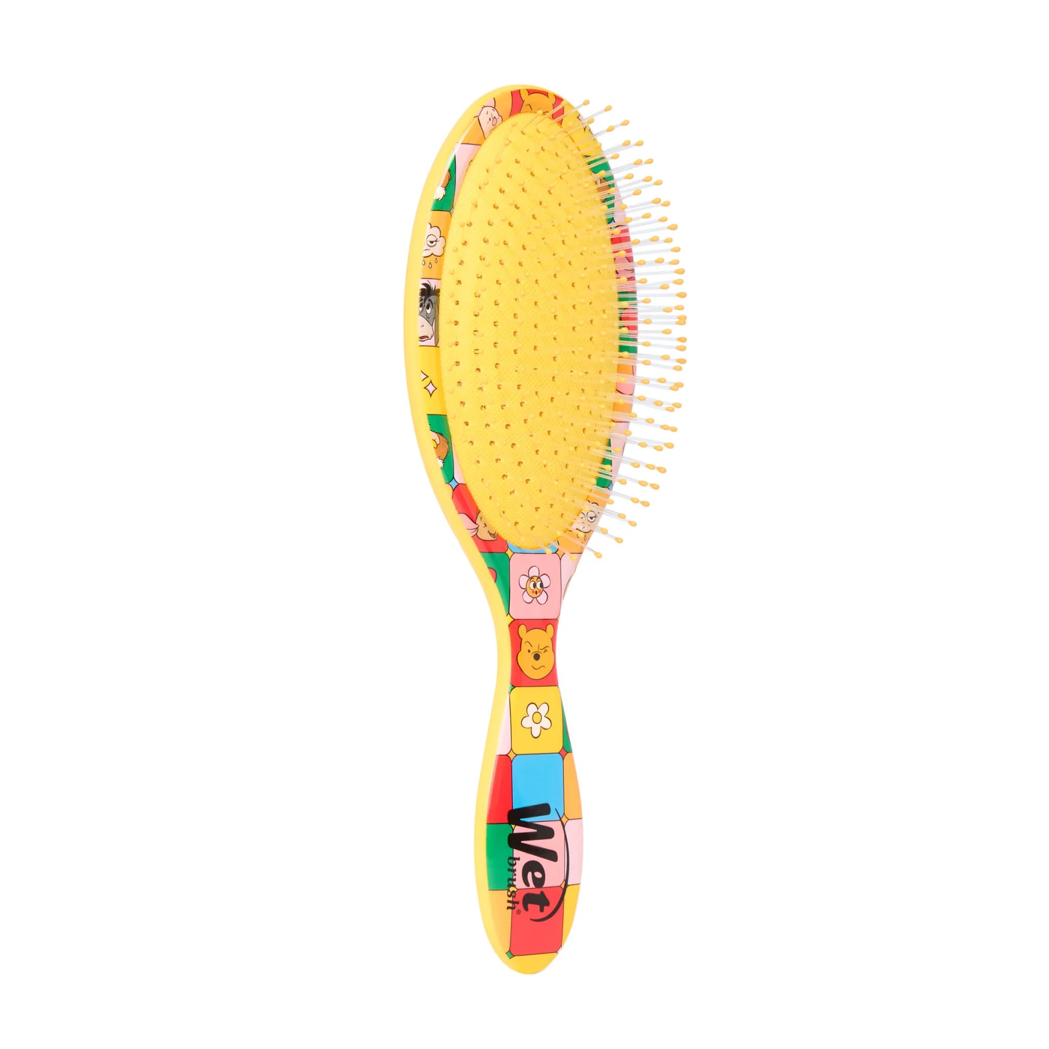 Winnie the Pooh hair detangler brush with colorful character design for gentle and easy hair styling