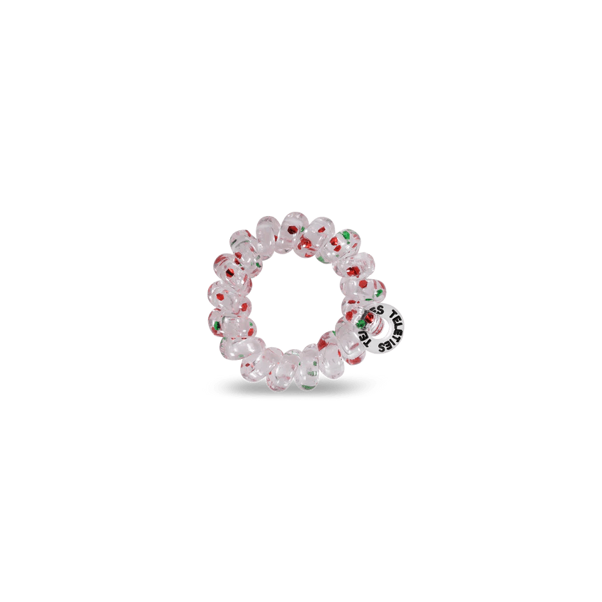 Teleties tiny hair ties in clear with festive red and green design for easy and stylish hair styling