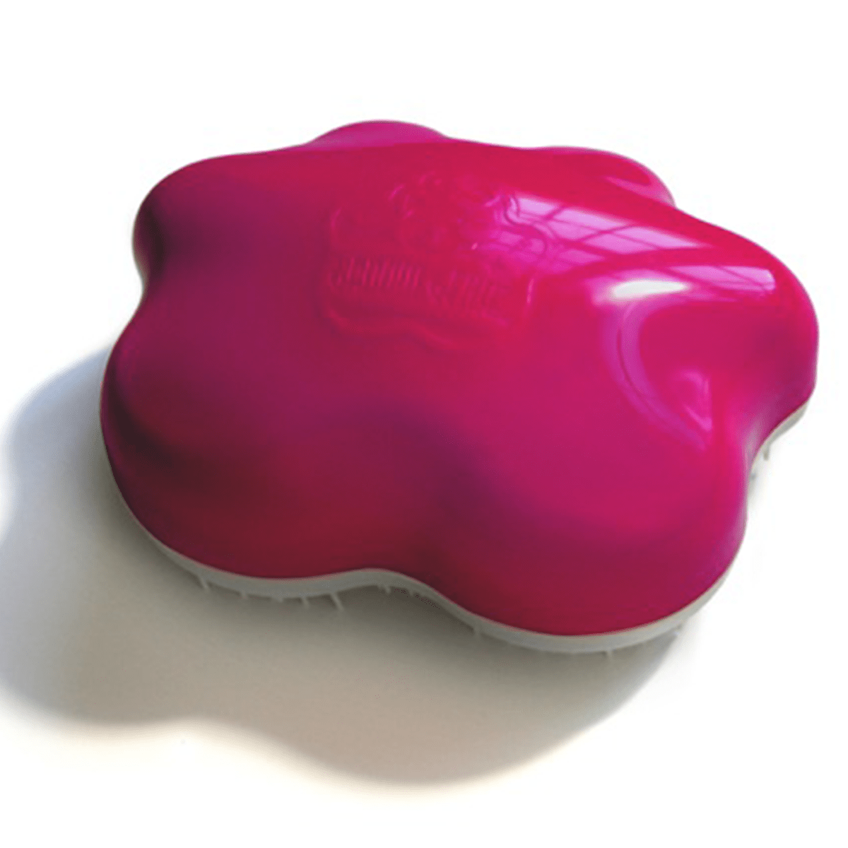 Groom Genie Teeny pet brush by Knot Genie in pink with ergonomic flower-shaped design for small pets