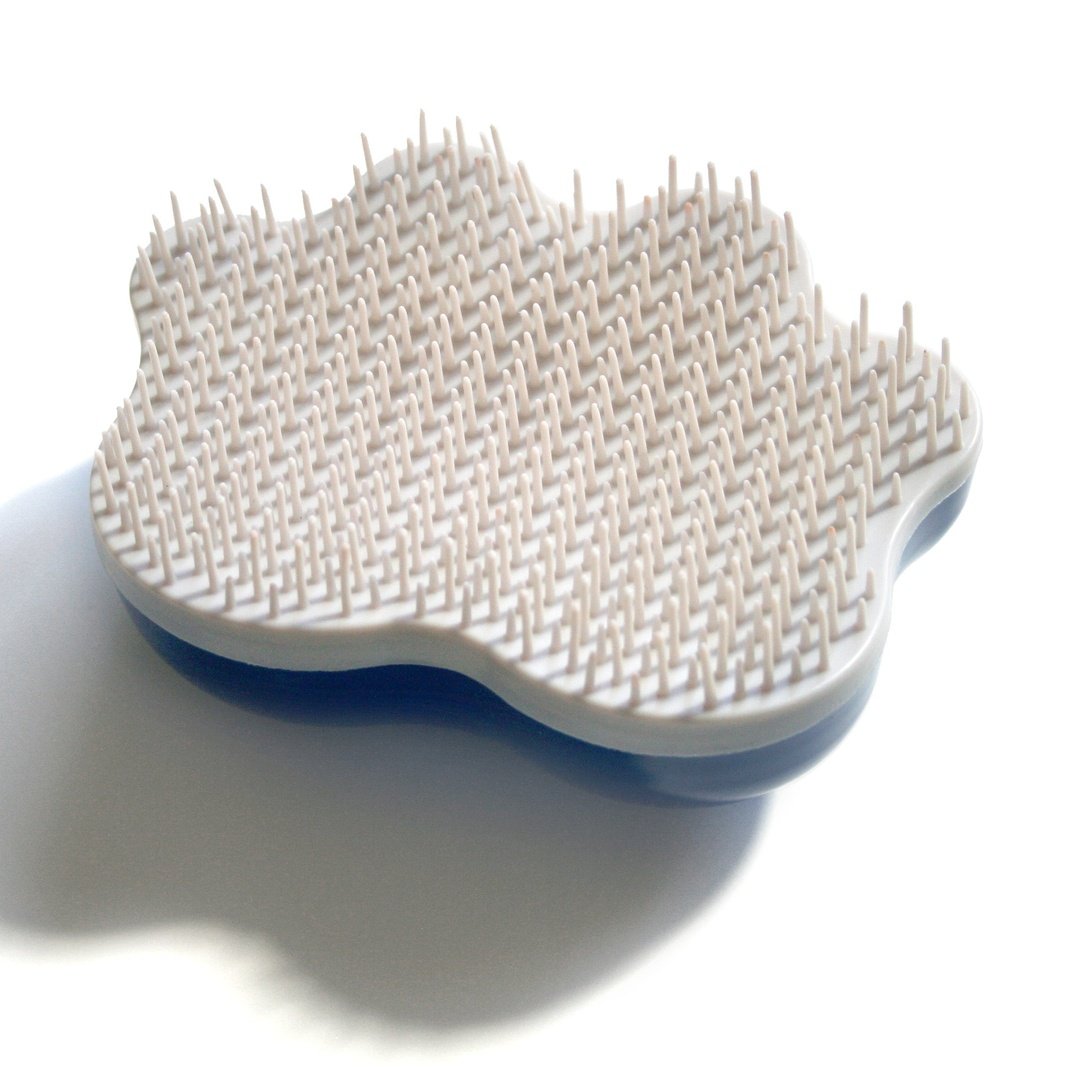 Groom Genie Teeny pet brush with soft flexible bristles for gentle grooming of small pets