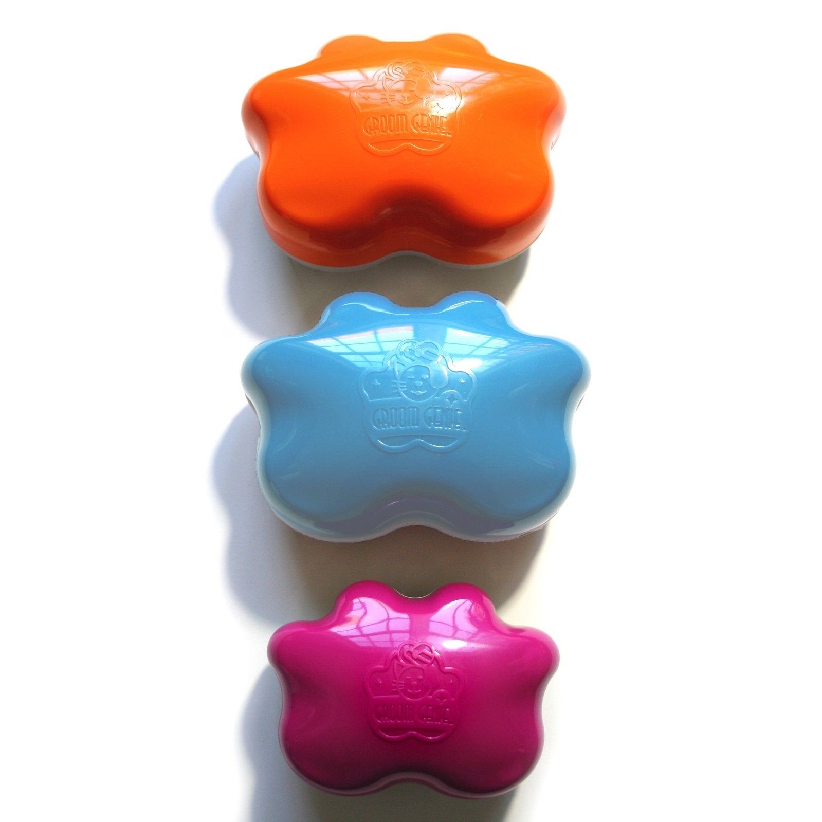 Knot Genie pet detangling brush set in orange blue and pink for grooming pets