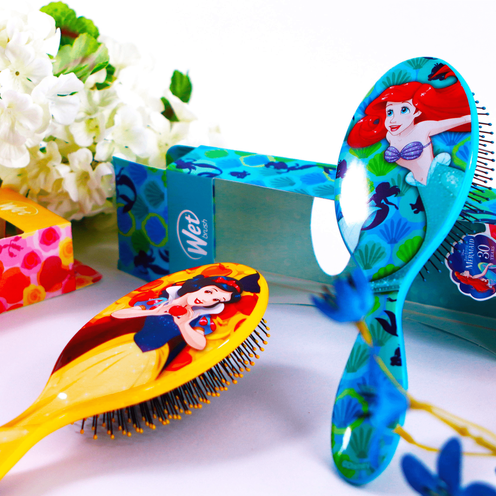 Wet Brush Disney Princess Hair Brush Set featuring Ariel and Snow White designs for effortless detangling