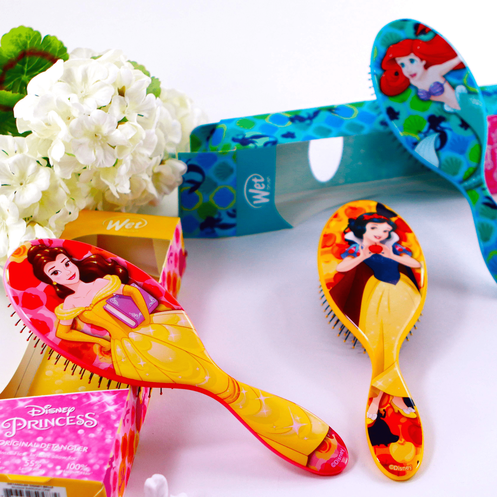 Wet Brush Disney Princess Hair Brushes featuring Belle and Snow White designs for gentle detangling