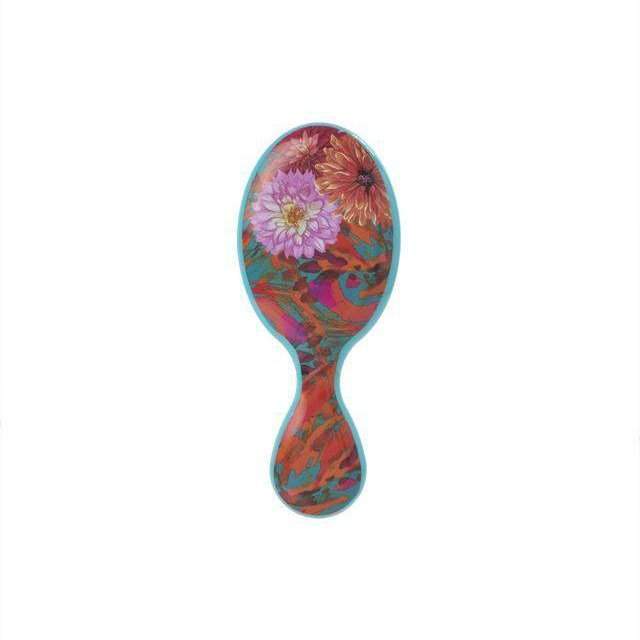 Wet Brush floral pattern detangler with colorful flower design and ergonomic handle