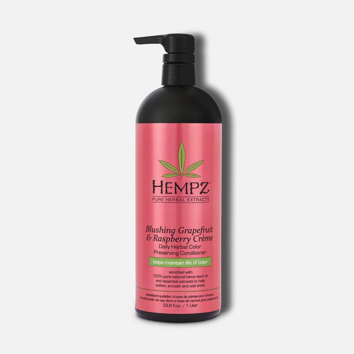 Hempz Blushing Grapefruit and Raspberry Crème Color Preserving Conditioner in a 33.8 fl oz bottle