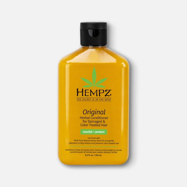 Hempz conditioner for damaged hair in yellow bottle, designed to nourish and protect color-treated hair