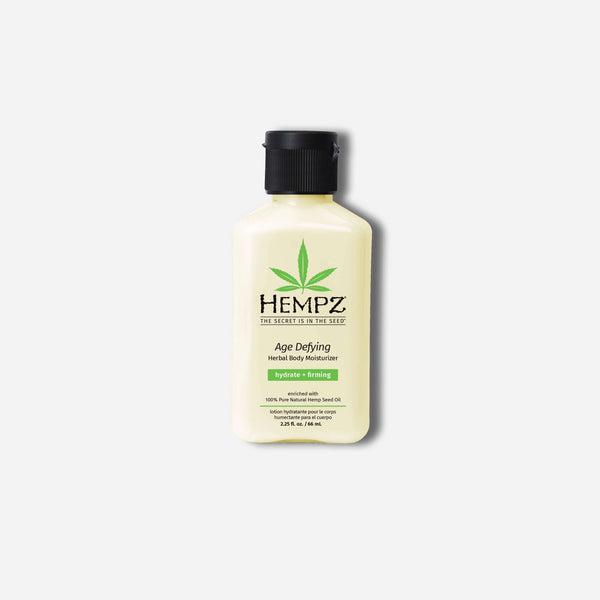 Hempz travel size moisturizer in a yellow bottle for hydrating and anti-aging skincare
