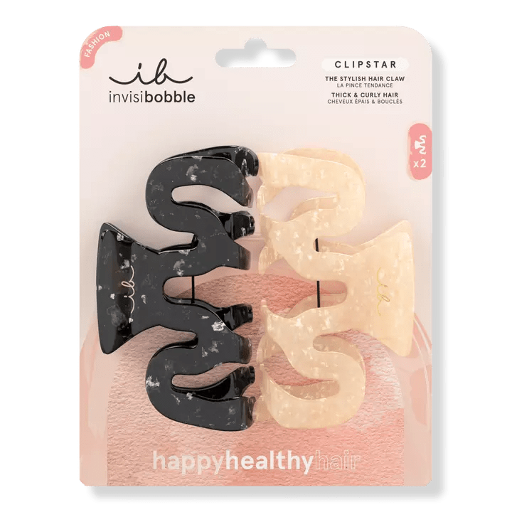 Invisibobble hair clips in black and cream, perfect for stylish hair styling and easy updos