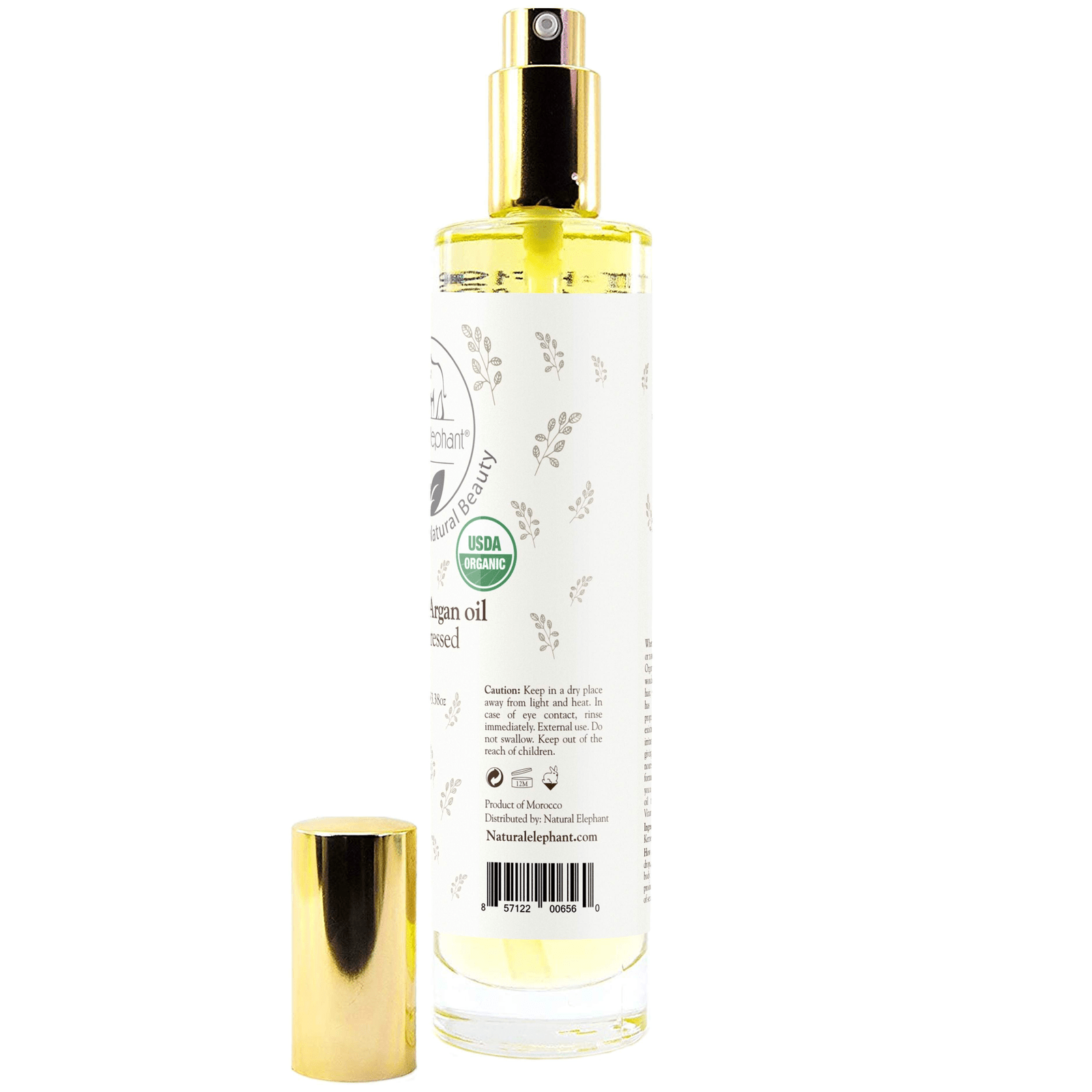 Natural Elephant organic argan oil in a clear spray bottle with a gold cap for skin and hair care