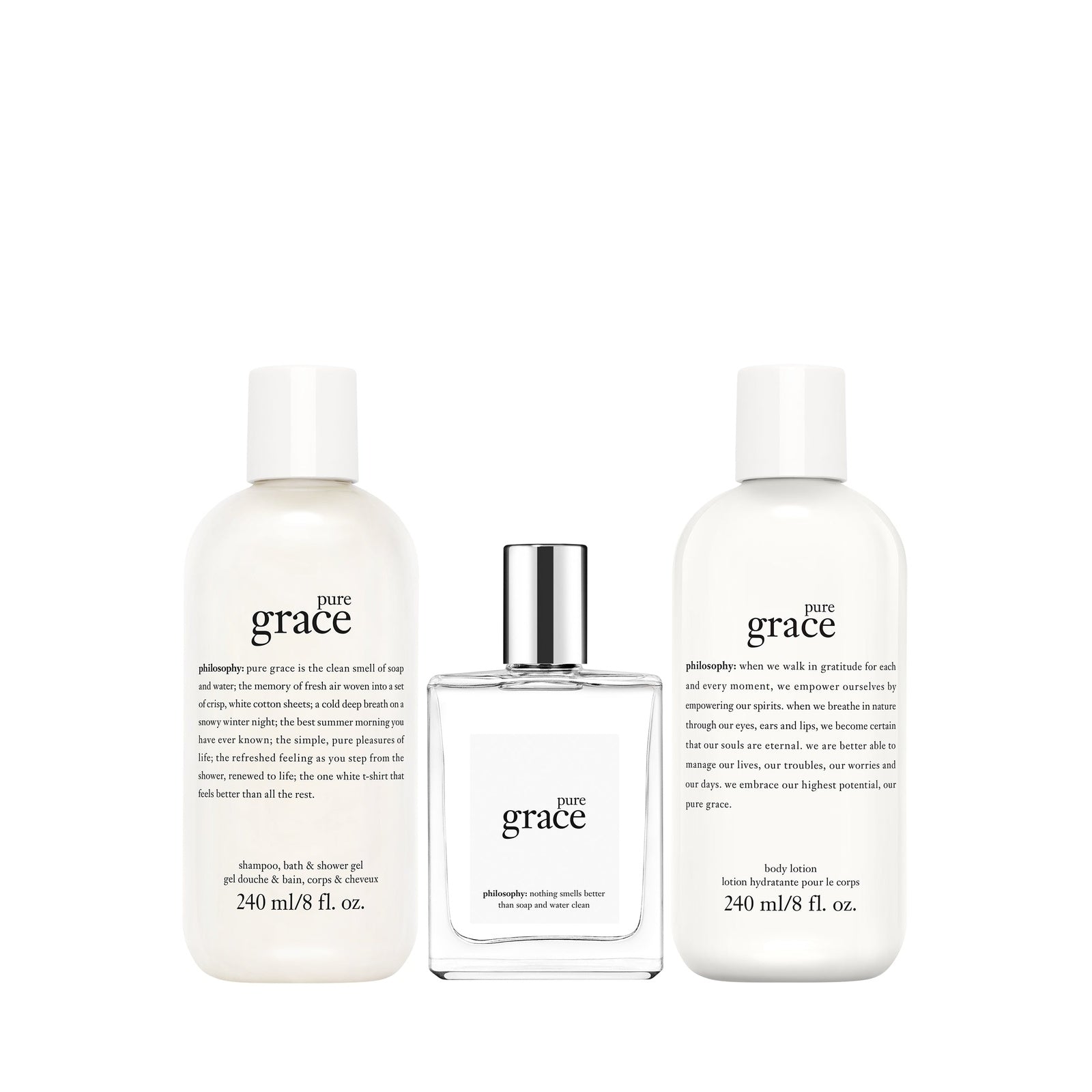 Philosophy Pure Grace gift set with shampoo, body lotion, and cologne in white bottles and clear perfume bottle