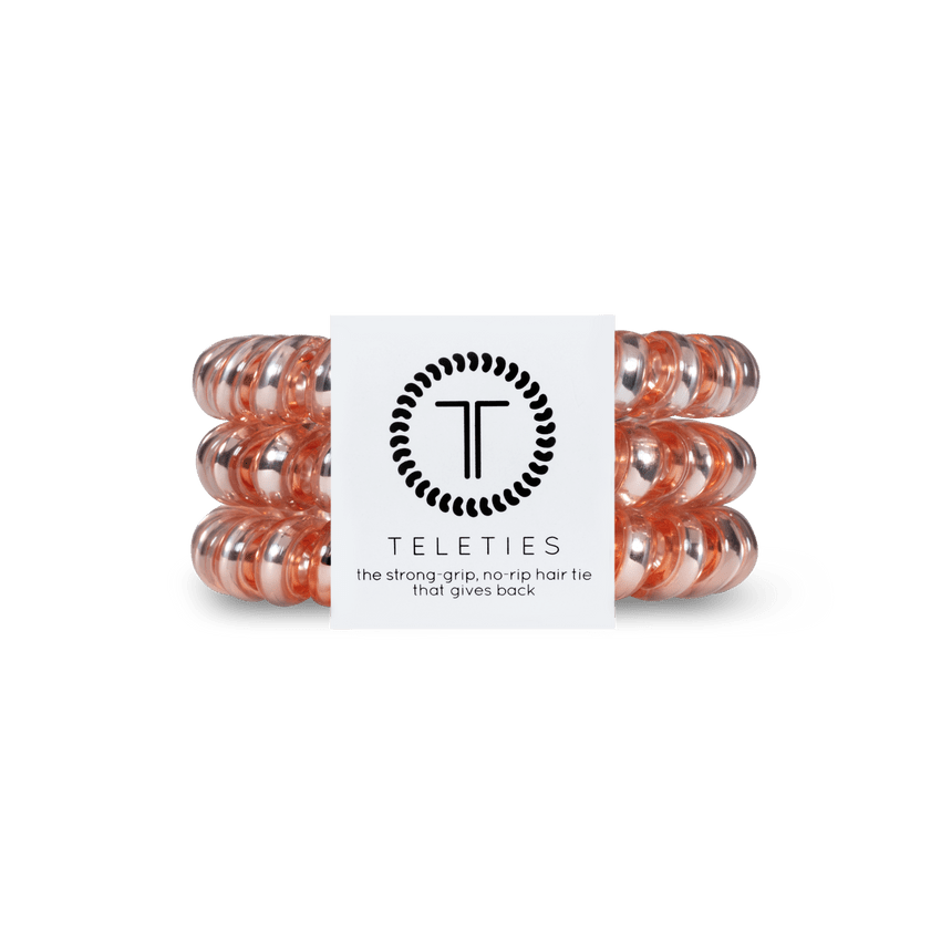 Teleties strong grip hair ties in peach color for a secure and stylish hair hold