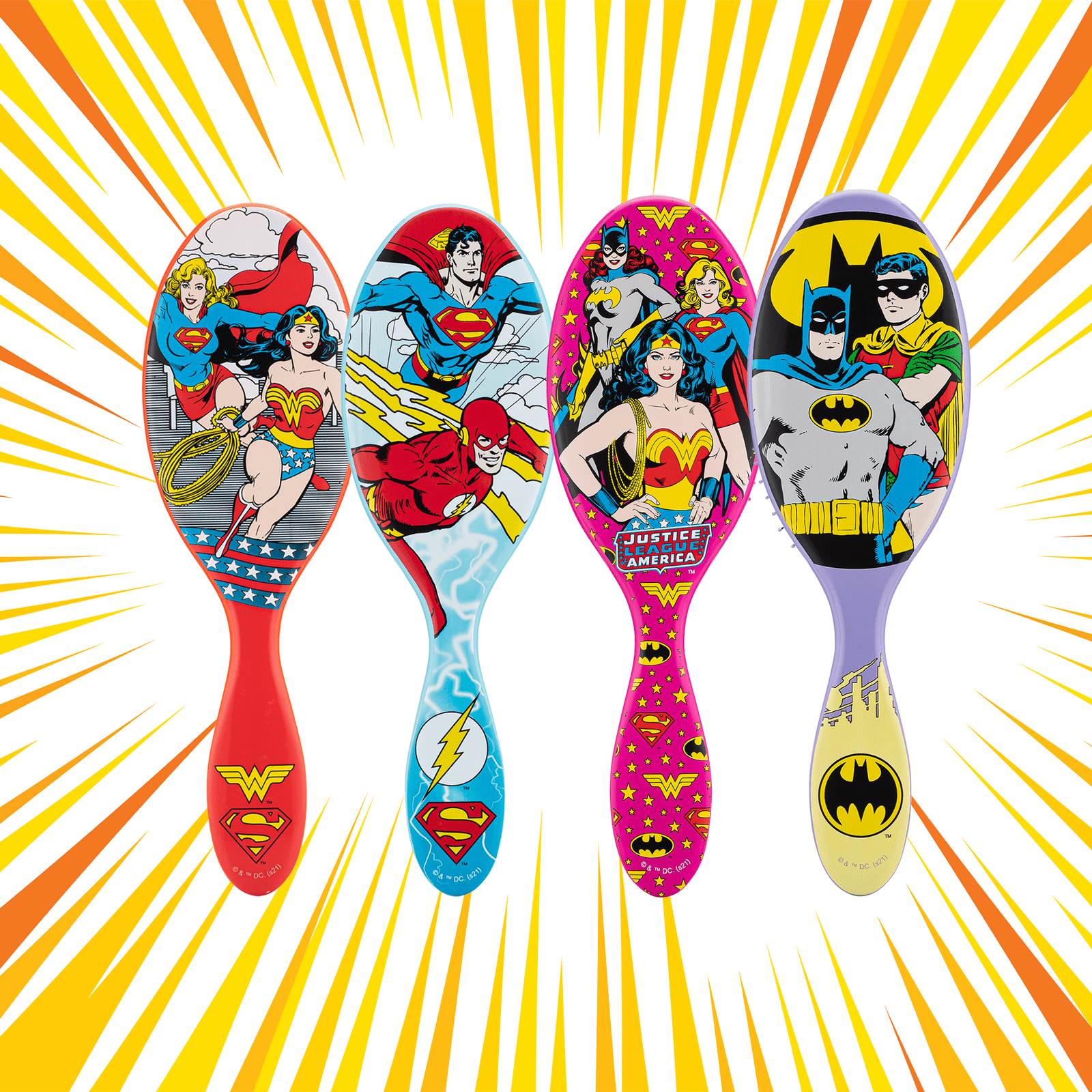 Justice League detangler brush set featuring superhero designs from Wonder Woman, Superman, and Batman