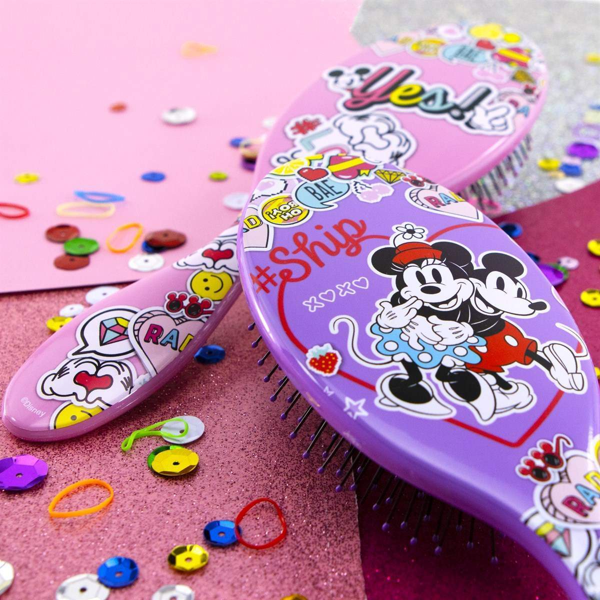 Wet Brush Minnie Mouse hair brush with colorful cartoon design on purple and pink background