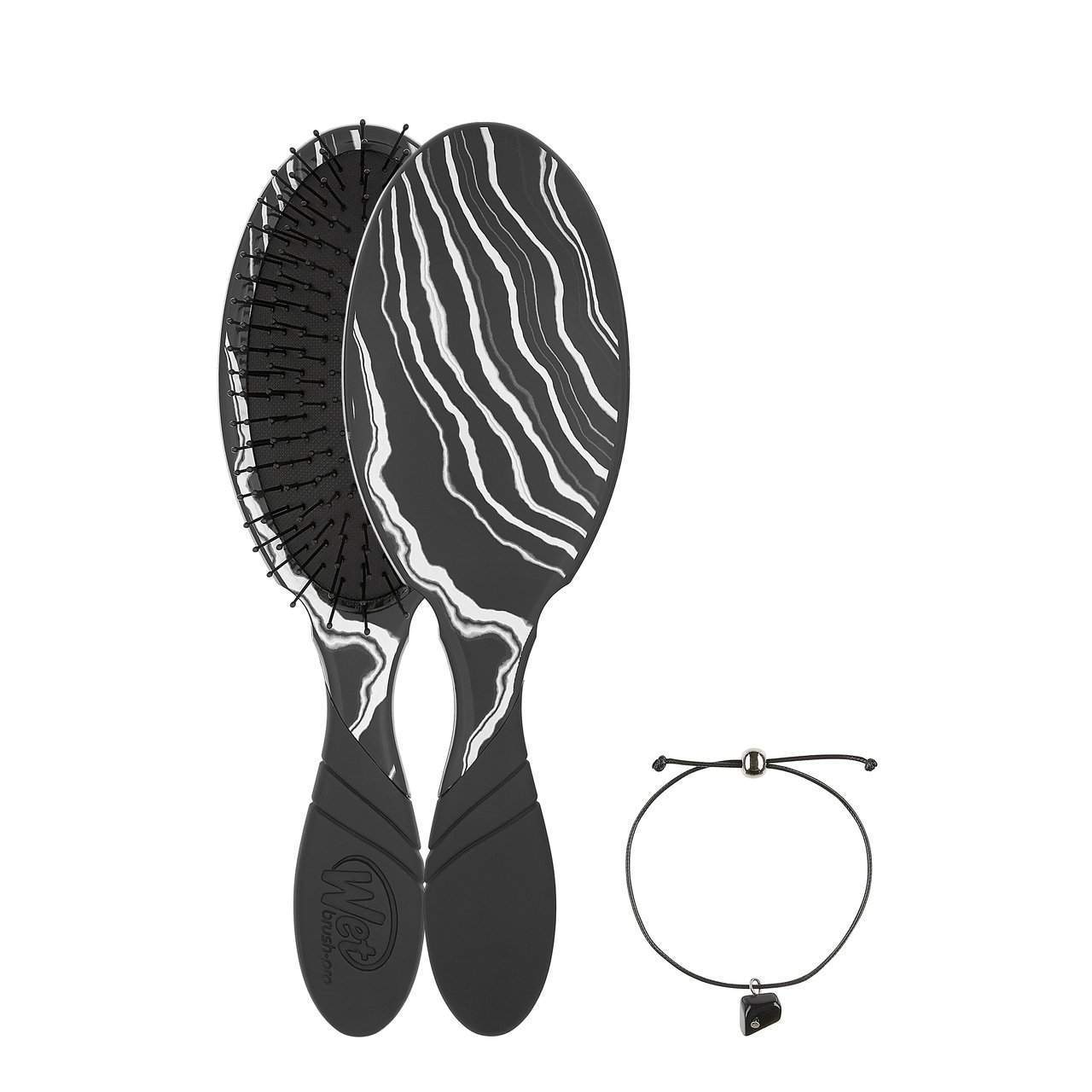 Wet Brush Mystical Crystal Detangler with black and white swirl design and matching adjustable bracelet