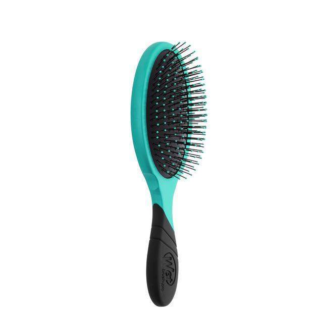 Wet Brush Pro Detangler in turquoise with soft bristles and ergonomic black handle for gentle hair detangling