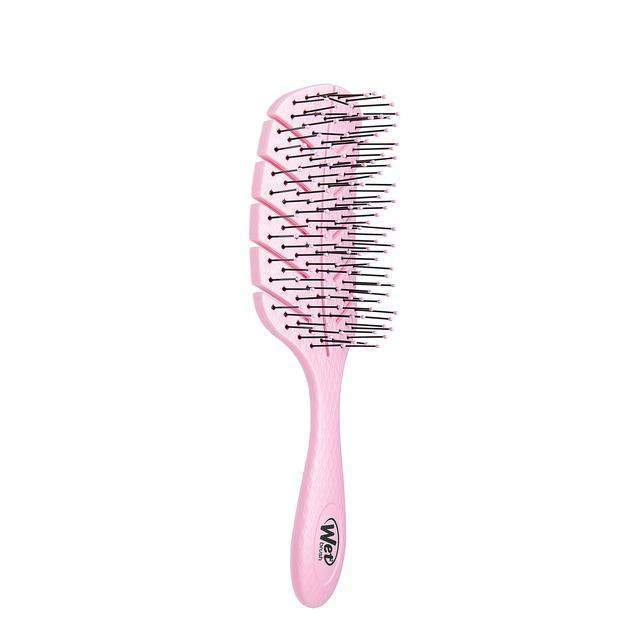 Wet Brush Eco-Friendly Hair Detangler in pink with flexible bristles for easy detangling