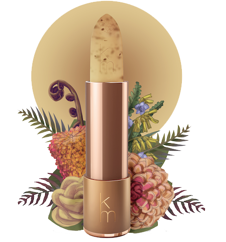 Karen Murrell natural lip scrub in rose gold lipstick tube with exfoliating balm and floral background