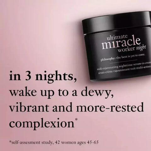 Philosophy ultimate miracle worker night serum for anti aging in black jar on pink background