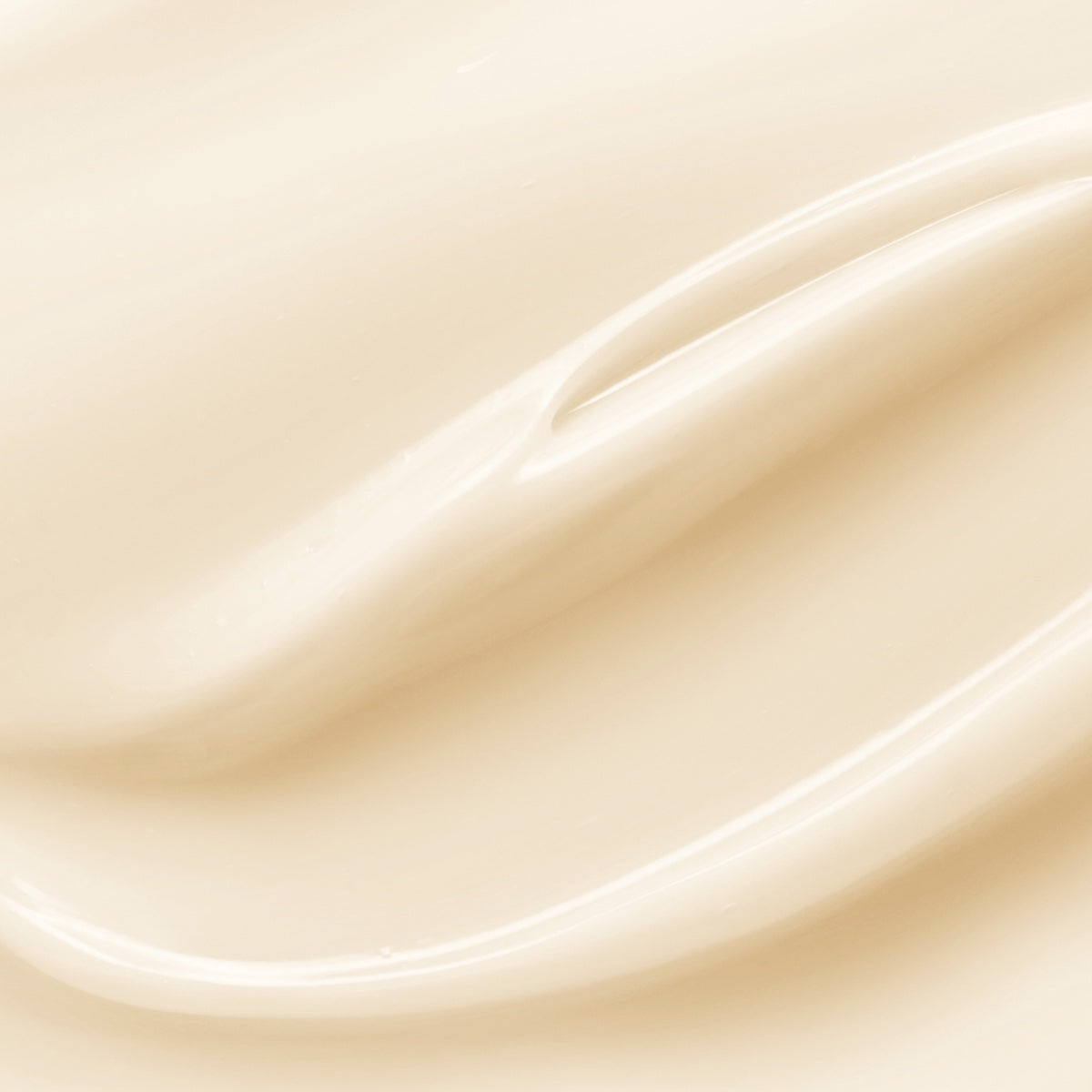 Smooth texture close-up of All Golden Go Velvet Primer 1 oz makeup base cream