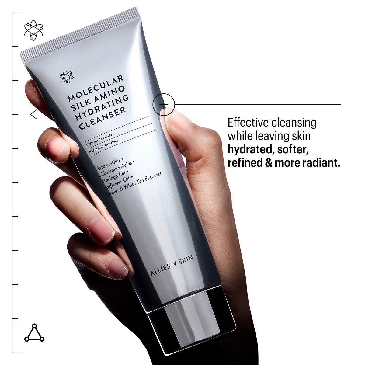 Hand holding silver tube of Allies of Skin hydrating cleanser Molecular Silk Amino hydrating formula