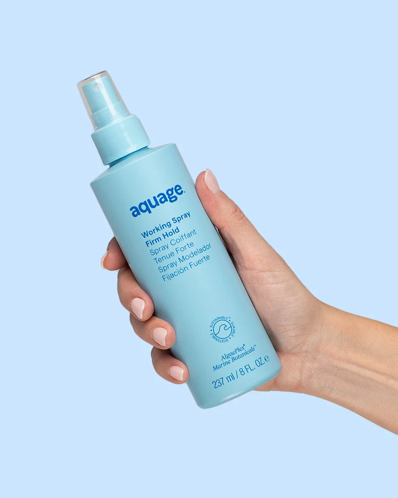 Aquage Working Spray in Hand, an effective heat protectant for hair spray with firm hold