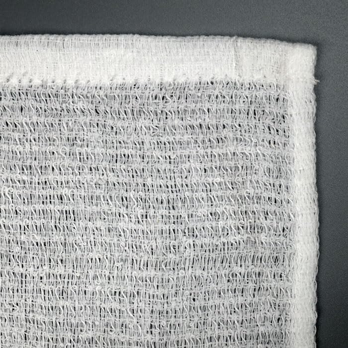 Close-up of soft cotton refreshment towels showing textured weave for superior absorbency