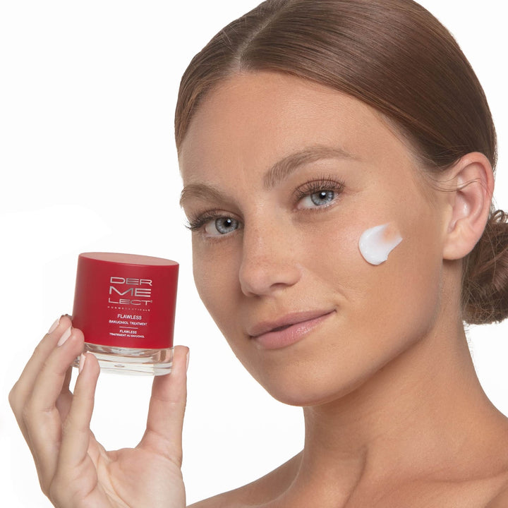 Model holding Dermelect Flawless Bakuchiol Treatment red jar with cream dabbed on her cheek