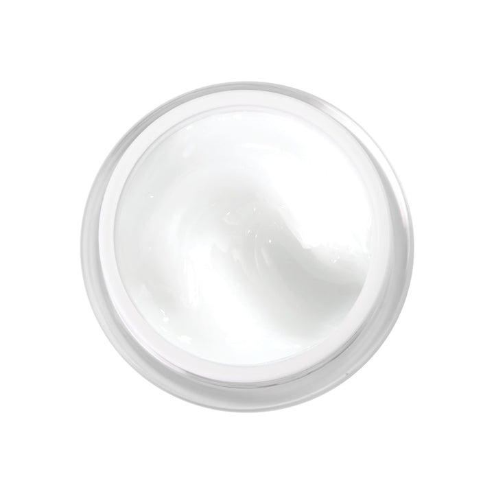 Top view open jar of white cream moisturizer Dermelect Flawless Bakuchiol Treatment for glowing skin