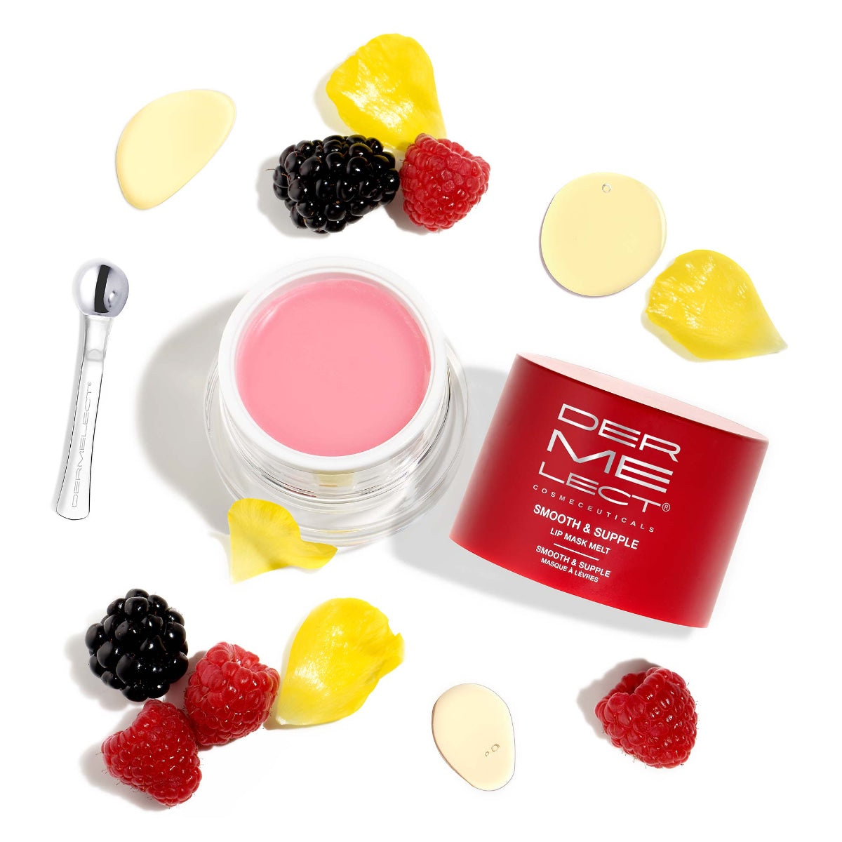 Dermelect lip mask melt jar with pink balm red packaging and applicator surrounded by berries and petals for hydrating lips