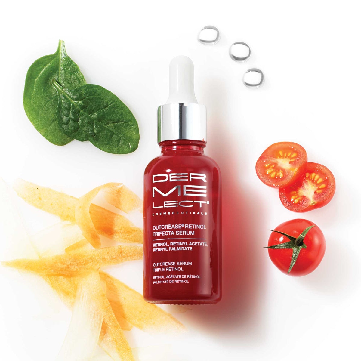 Dermelect Outcrease Retinol Trifecta Serum red glass dropper bottle with spinach tomato and ginger on white background
