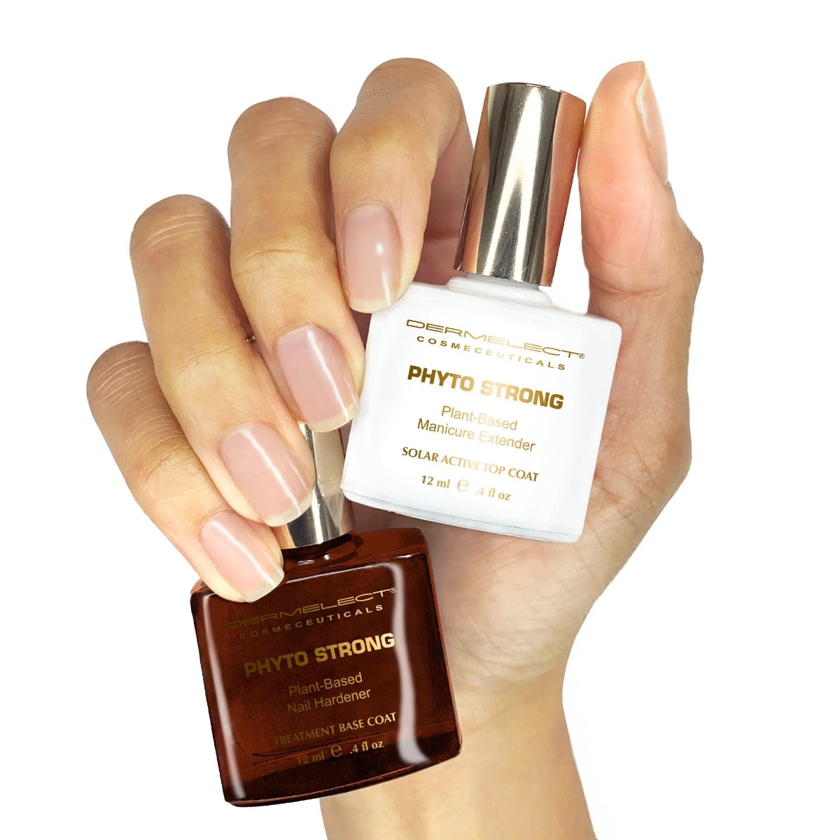 Dermelect Phyto Strong manicure set held in hand showing plant based base coat and top coat