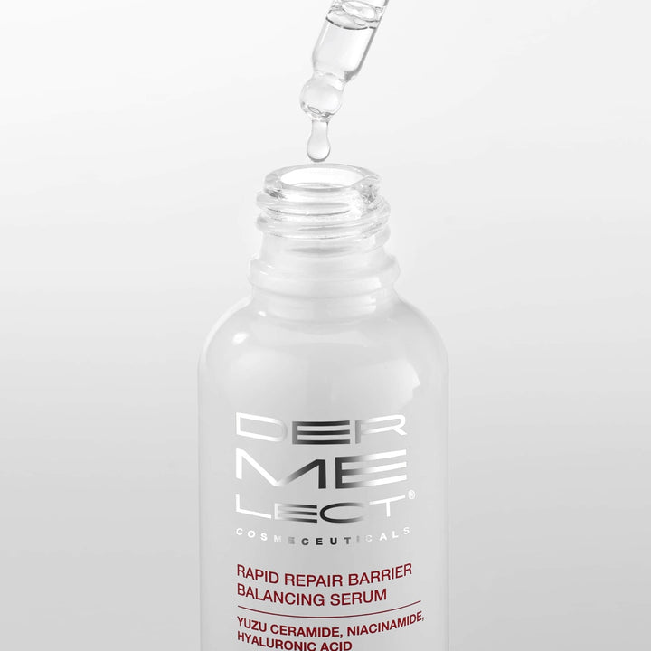 Dermelect Rapid Repair Serum glass bottle with dropper releasing a clear drop over open bottle