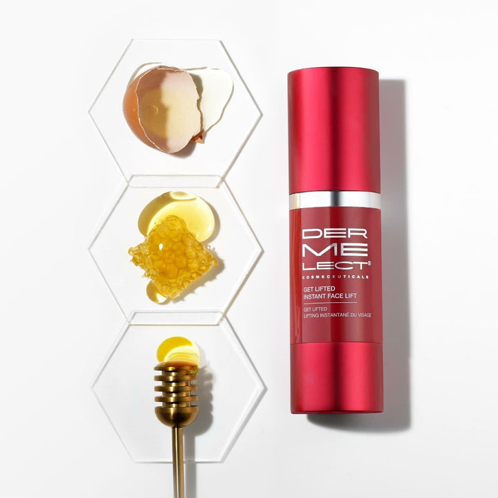 Dermelect instant face lift serum bottle with honeycomb and golden serum swatches on hex dishes