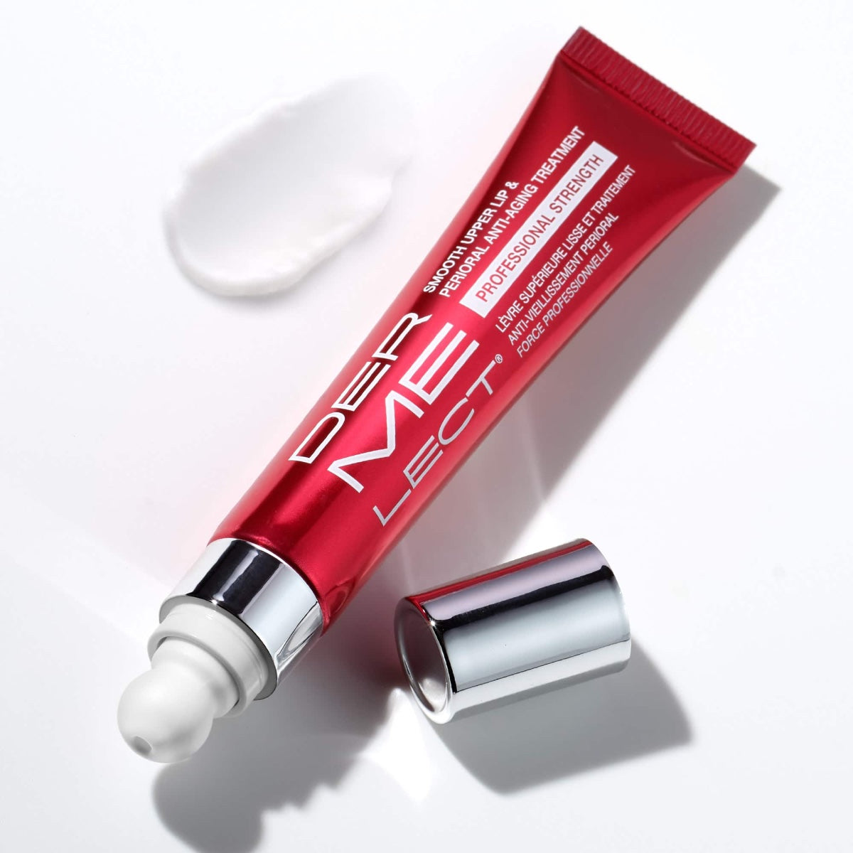 Dermelect red tube with precision roller applicator and cream smear for upper lip anti-aging cream treatment