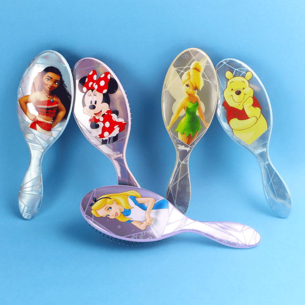 Disney 100 wet brush set featuring Moana, Minnie Mouse, Tinkerbell, Winnie the Pooh, and Alice in Wonderland designs