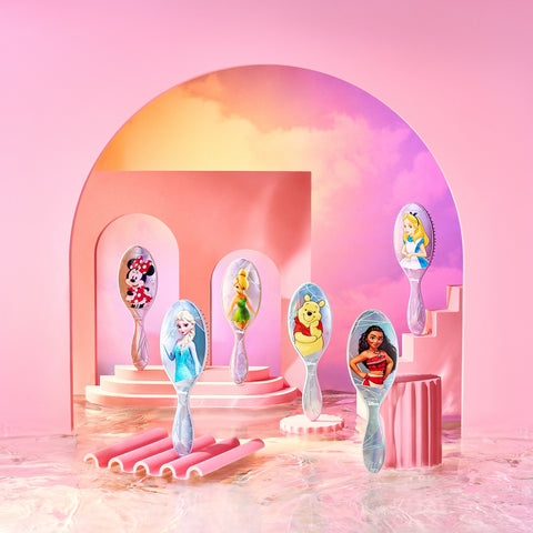 Disney 100 wet brush collection featuring popular characters on colorful brushes for effortless detangling