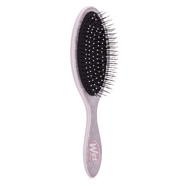 Disney 100 wet brush designed for gentle detangling with a comfortable grip and flexible bristles