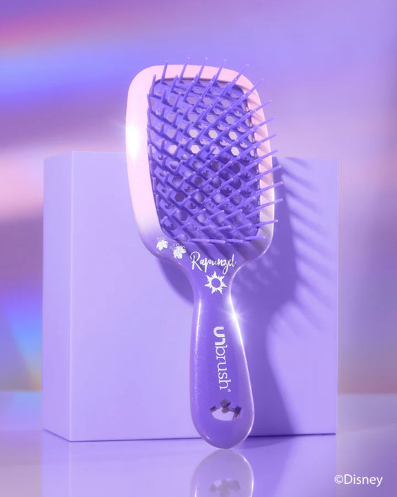 Unbrush Disney Princess detangling hair brush in purple with flexible bristles for gentle hair care