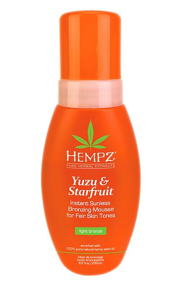 Hempz sunless bronzing mousse in orange bottle with yuzu and starfruit for fair skin tones
