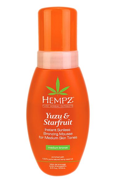 Hempz sunless bronzing mousse in Yuzu and Starfruit for medium skin tones, providing instant bronzing effect
