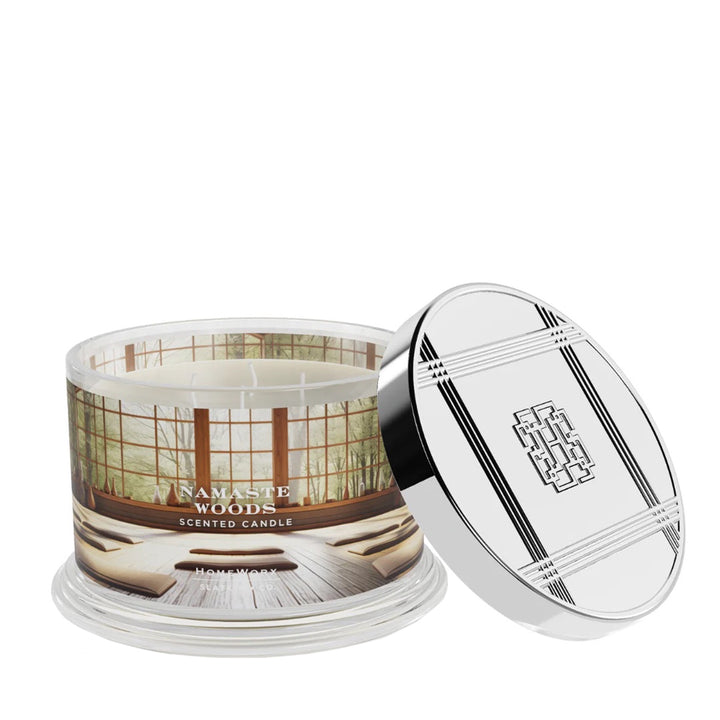 HomeWorx by Slatkin Namaste Woods scented candle with forest design and silver lid